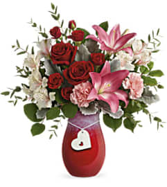 Charmed 'n Love. An arrangement by Palmetto Gardens Florist.