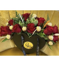 Heart of roses and ferreros. An arrangement by Lake Eola Florist.