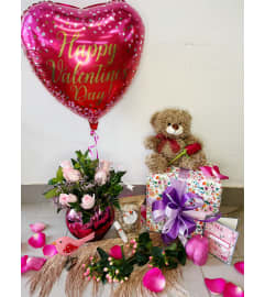 Sweetheart Gift Package. An arrangement by Osborne Florist.