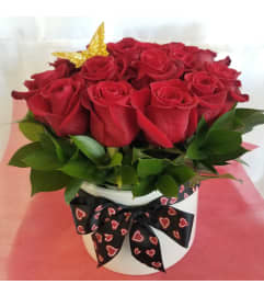Red Roses with Yellow Butterfly. An arrangement by M's Flowers.