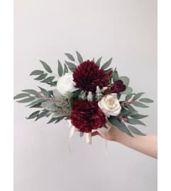 BRIDESMAIDS BOUQUET. An arrangement by Geni's Florist and Gifts.