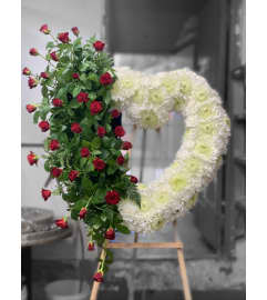 Red rose cluster. An arrangement by Massey's House of Flowers.