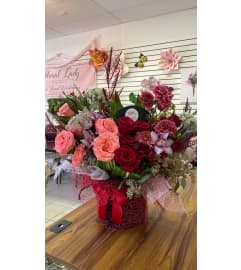 Rose garden in a box. An arrangement by Floral Lady Design Studio LLC.