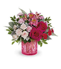 Teleflora's Vintage Elegance Arrangement. An arrangement by Hourans on the Corner Florist.