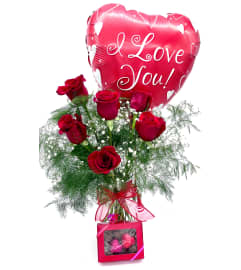 Hugz and Kisses Gift Set. An arrangement by The Village Green Florist.