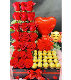 box roses chocolates. An arrangement by Spring Branch Florist.