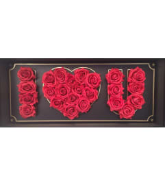 Deep Love Rose Box. An arrangement by Susana's Flowers.