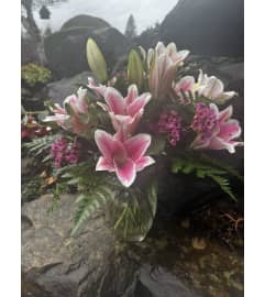 Vase of Pink Oriental Lilies. An arrangement by Renton Flower Shop.