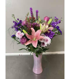 Passion for purple. An arrangement by Yesterday's Florist and Gifts.