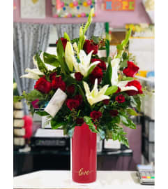 Love Vased. An arrangement by Geni's Florist and Gifts.