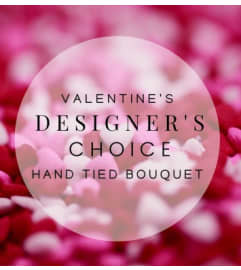 Valentine's Day Florist Choice wrapped Bouquet. An arrangement by Nicol Florist.