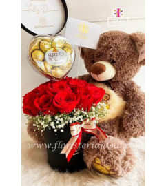 Roses, bear and chocolate. An arrangement by Floreria Mexico.