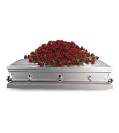 FOREVER LOVE CASKET SPRAY. An arrangement by J.D. Ballantine's Flowers and Gifts.