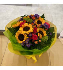 Sunny Blooms. An arrangement by Petals.