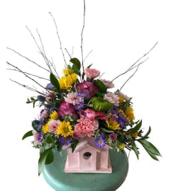 Blooms and Birds. An arrangement by Loyalist Flowers.