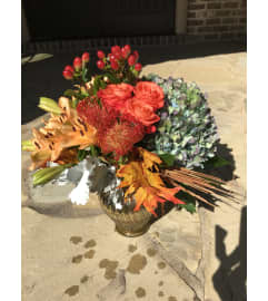The Garden of Eden. An arrangement by Seasons Change Designs.