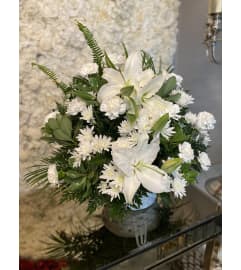 Serene Basket. An arrangement by Seasons Change Designs.