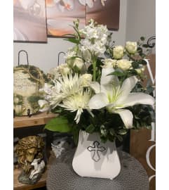 At the Cross. An arrangement by Seasons Change Designs.