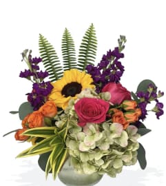 It's A Good Day. An arrangement by Seasons Change Designs.