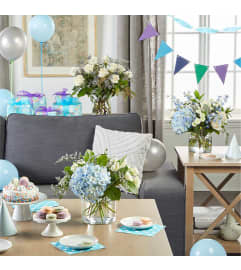 Carolina Blues Event Settings. An arrangement by Floral Insight.