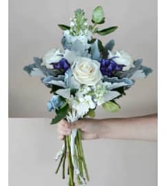 BRIDESMADE BOUQUET WHITE BLUE. An arrangement by Geni's Florist and Gifts.