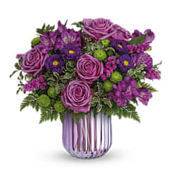 Luxurious Purple Bouquet. An arrangement by Flowers of Jacksonville.