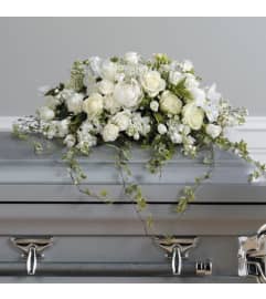 White Flower Casket Spray. An arrangement by Fletcher Heights Florist.