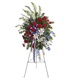SACRED SERVICE STANDING SPRAY. An arrangement by J.D. Ballantine's Flowers and Gifts.