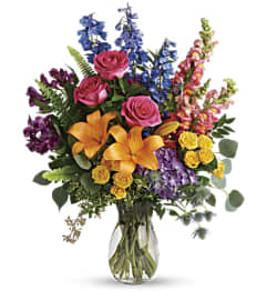 COLORFUL RAINBOW BOQUET. An arrangement by J.D. Ballantine's Flowers and Gifts.