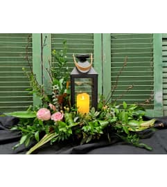 Fresh Lantern Arrangement. An arrangement by Forest Florist.
