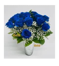 Marine Blue Roses. An arrangement by Brickell Exclusive Blooms. Marine Blue Roses. An arrangement by Brickell Exclusive Blooms.