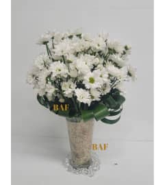 Love me Love me not White Margaritas. An arrangement by Brickell Ave Florist. Love me Love me not White Margaritas. An arrangement by Brickell Ave Florist.