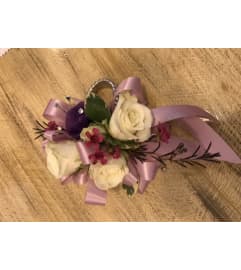 Sweet Thing Corsage. An arrangement by Jodi's Country Corner and Florist.