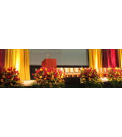 Stage. An arrangement by Geni's Florist and Gifts.