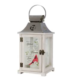 WOODEN CARDINAL SYMPATHY LANTERN. An arrangement by Novak's Flower Shoppe.