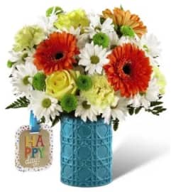 THE FTD® HAPPY DAY ™ BOUQUET BY HALLMARK. An arrangement by Triple A Florist.
