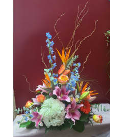 Birds, Butterflies and Blues. An arrangement by KW Flowers.