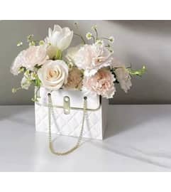 Lovely Purse. An arrangement by Flowers by La Gi.
