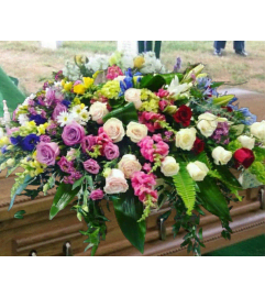 The Garden Path Casket Spray. An arrangement by Loyalist Flowers.