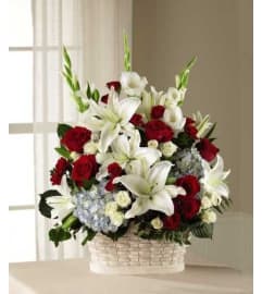 Patriotic Basket 1. An arrangement by Conny's Flower Shop.