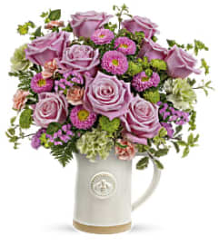 Moms artisanal Pitcher. An arrangement by Palmetto Gardens Florist.