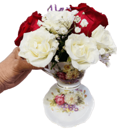 Tea Cup Set. An arrangement by Geni's Florist and Gifts.
