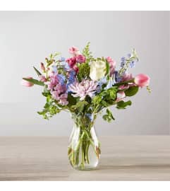 Soft Spring Bouquet. An arrangement by Geni's Florist and Gifts.