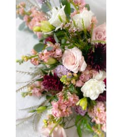 RUSTIC peachy keen. An arrangement by Rustic Floral and Gifts.