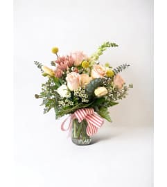 RUSTIC Peach summer sunset. An arrangement by Rustic Floral and Gifts.