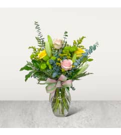 RUSTIC Kaitlyn's Spring. An arrangement by Rustic Floral and Gifts.