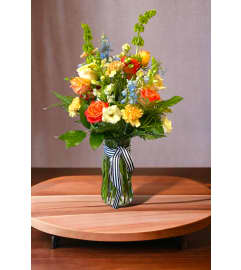 RUSTIC Sweet summer. An arrangement by Rustic Floral and Gifts.