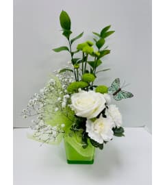 Colour Splash Flower Arrangement - Green. An arrangement by Balloon Bouquets Plus.