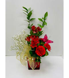 Colour Splash Flower Arrangement - Red. An arrangement by Balloon Bouquets Plus.