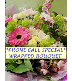 PHONE ORDER SPECIAL BOUQUET. An arrangement by Triple A Florist.
